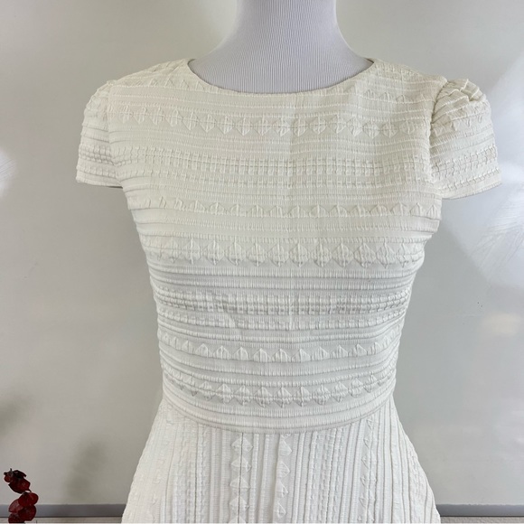๐Host Pick๐ Alice + Olivia White Embossed Print Cap Sleeve Skater Dress 4 $295 - Picture 4 of 11